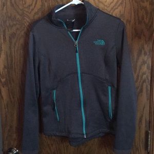 Charcoal gray and teal women’s Northface zip-up